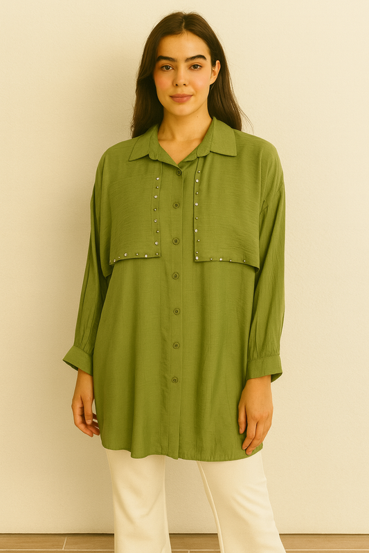 A longline button-down tunic shirt in a fresh green shade with stylish stud detailing.