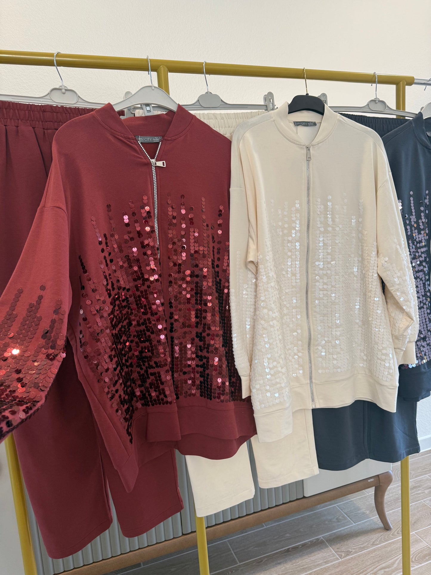 Two-piece sequin tracksuit.