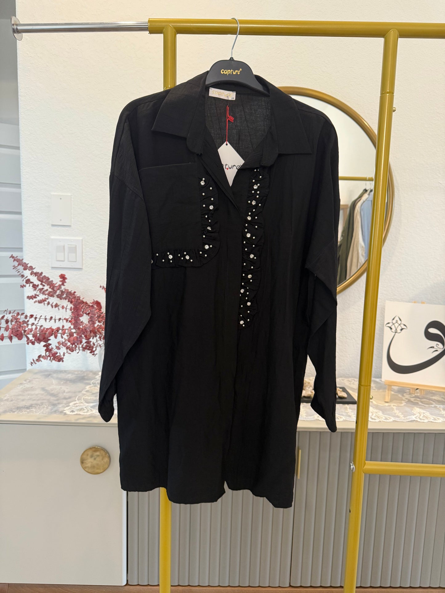 A longline button-down tunic shirt