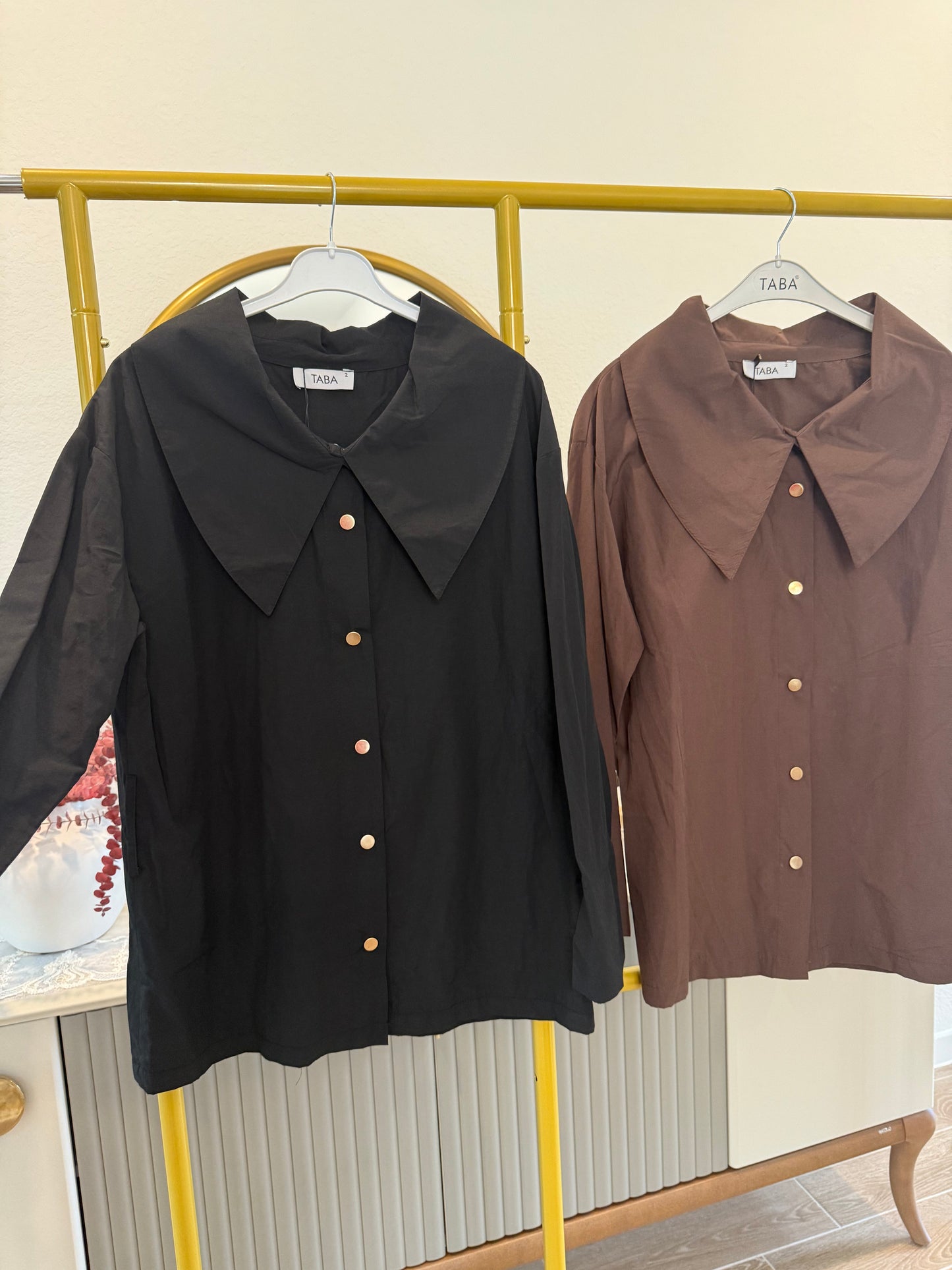 Long-sleeve button-down blouse with a bold oversized collar