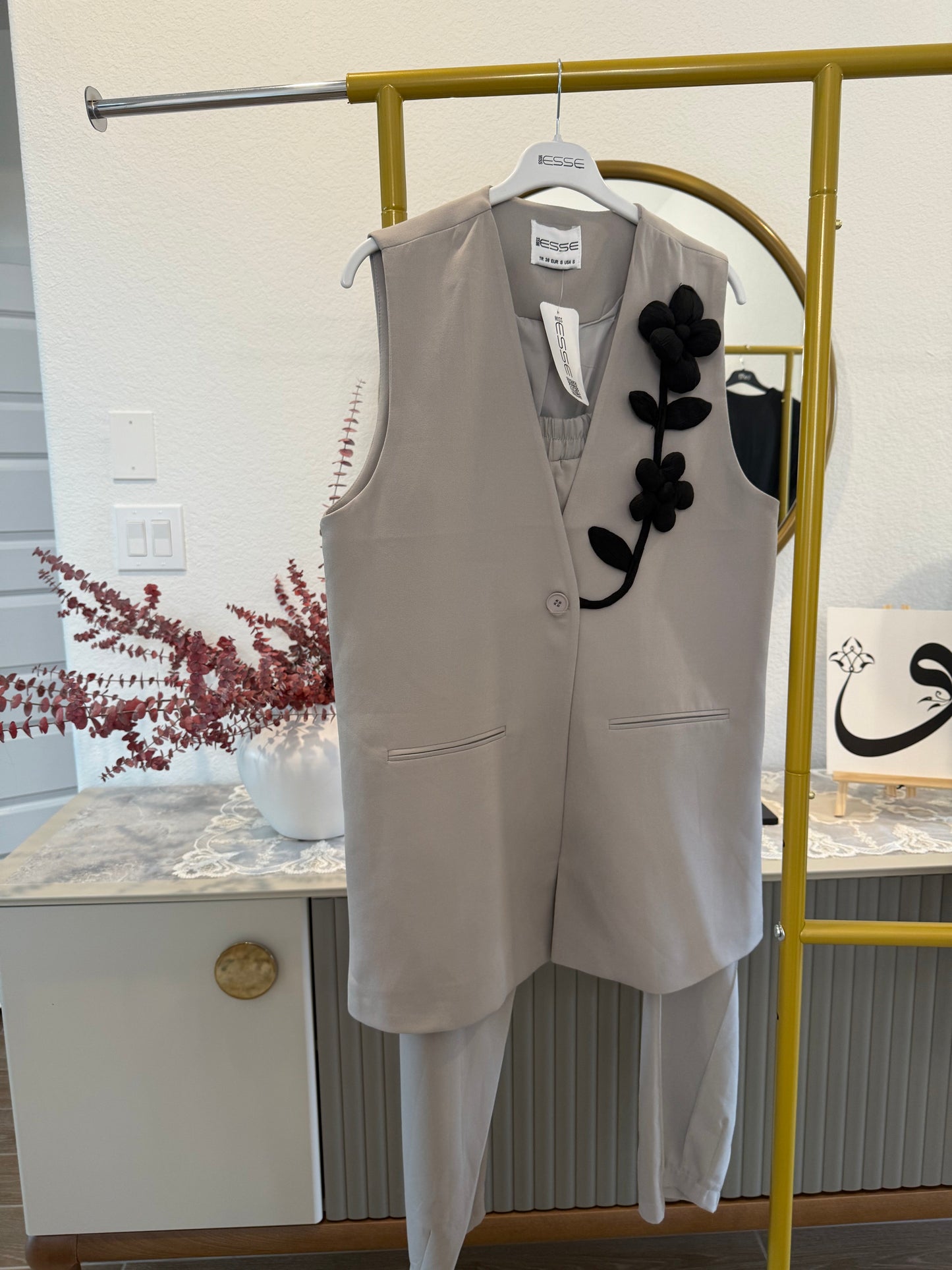 A two-piece sleeveless vest and pants set