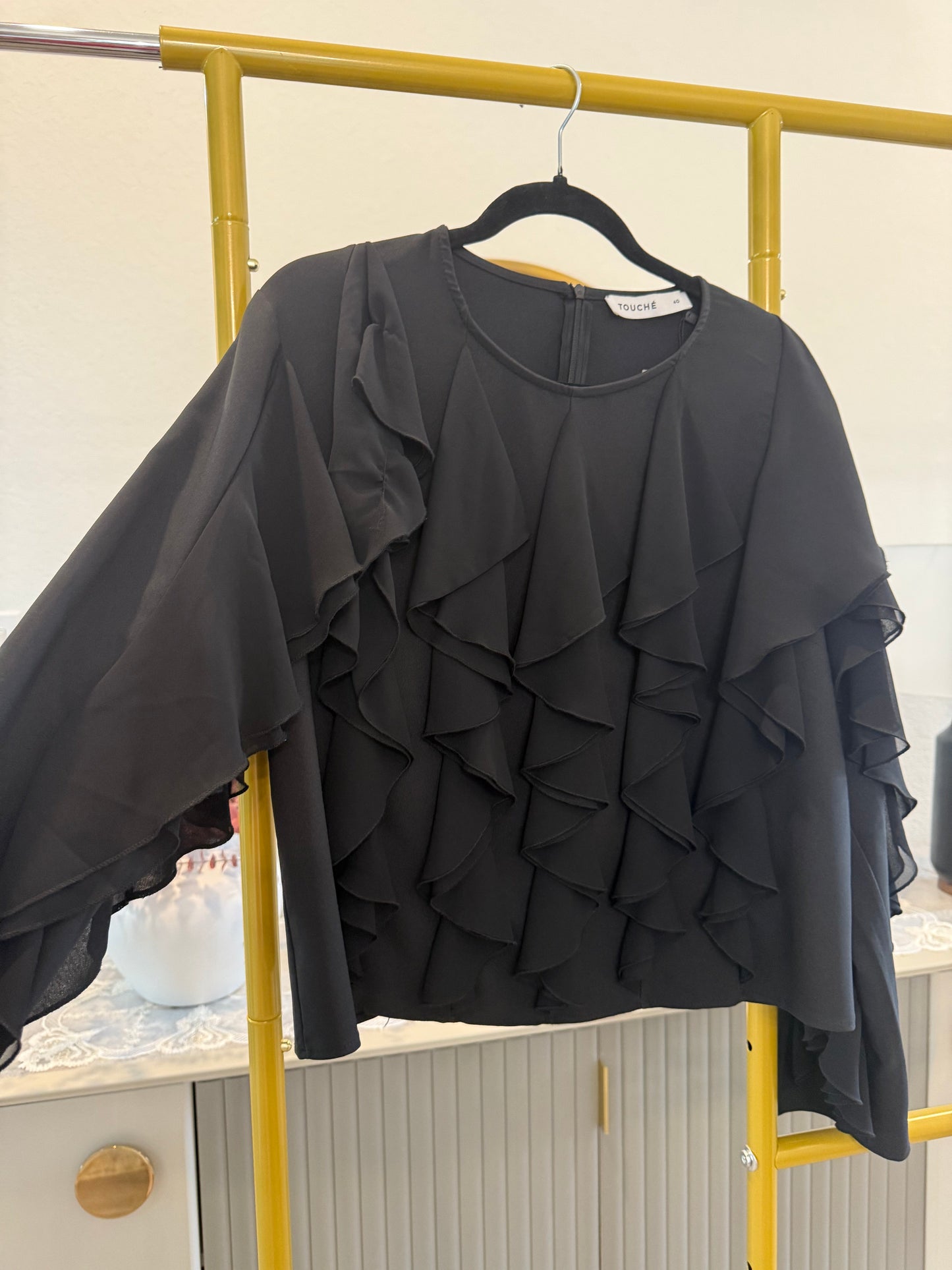 Black ruffled blouse (Touche brand)